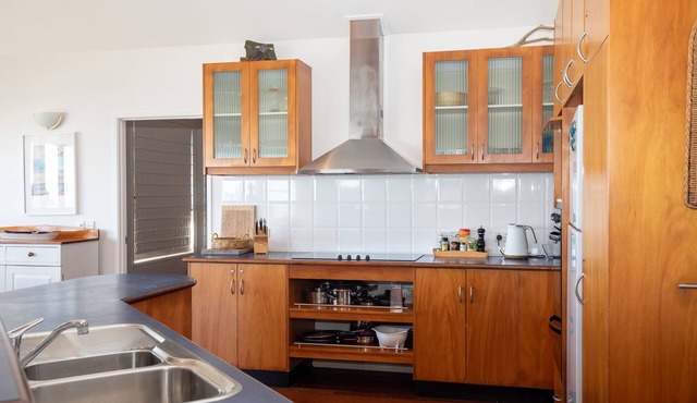 Set high with sweeping ocean views to Moreton Island and Cylinder Beach.