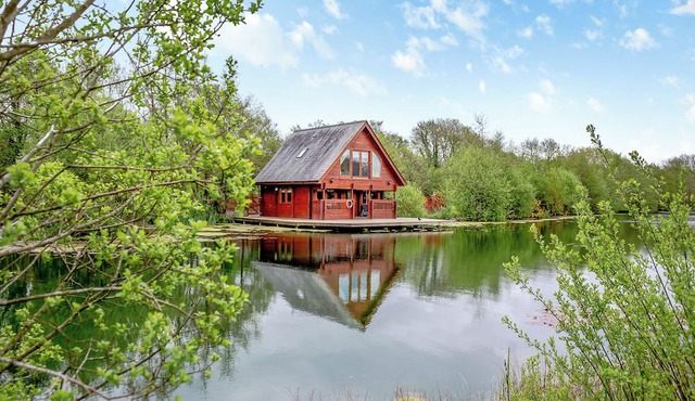 Set in a peaceful location and perched over the lake.