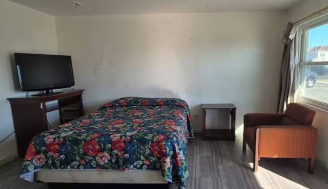 Settle Into a Queen Bed Near Picnic Island Park | Free Parking