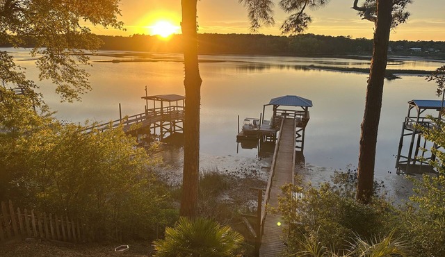 Shallotte Riverfront Two-Bedroom Home w/ Private Dock Minutes from Area Beaches