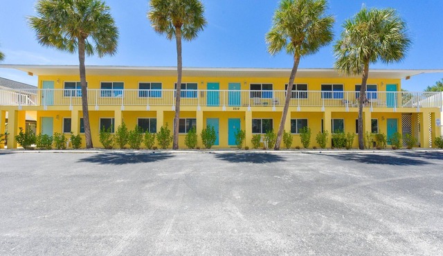 Share Our Island Paradise-100 flip-flop steps to the beach.