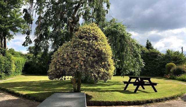 Shaw House is a lovely property offering a large garden.