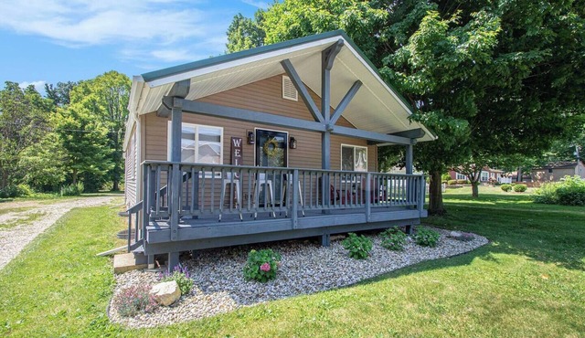 Short Description: Lakewood Bungalow | Screened Porch 2 Baths Basement Hangout Walk to Lake Onsite Laundry