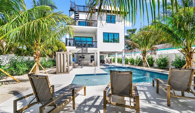 Showstopping home with a Pool, Rooftop Deck, and Games! Sun-Day Style