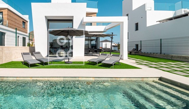 Sierra y Sal - designer villa, heated pool, mountain, sea views - by OYOOSTAYS
