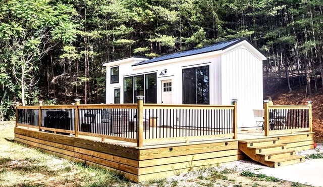Simple meets modern in this farmhouse style tiny home!