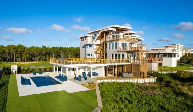 Simply the Finest - New Modern Waterfront Home w/Saltwater Pool