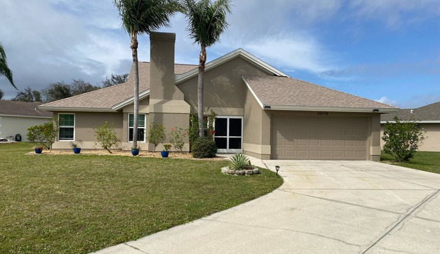 Single family, 4 bedroom, 2.5 bath, 2 car garage, lanai w/pool, outdoor shower.