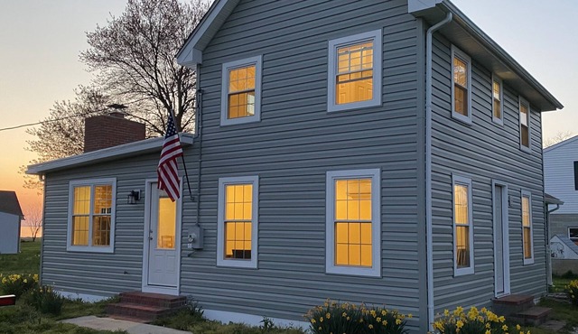Single family home with screened porch.