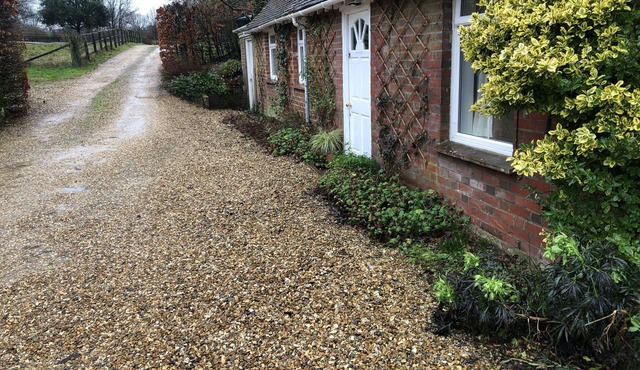 Single floor, self-catering Annexe next to main house, with parking.