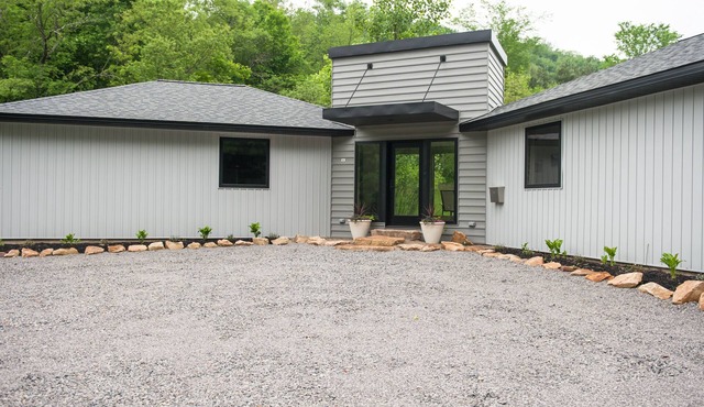 Single Level Home with Deck and Creek