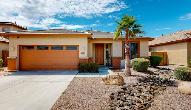 Single-level home with private pool, golf course views, pool table, & W/D