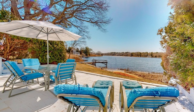 Single-level riverfront retreat, electric fireplace, & washer/dryer