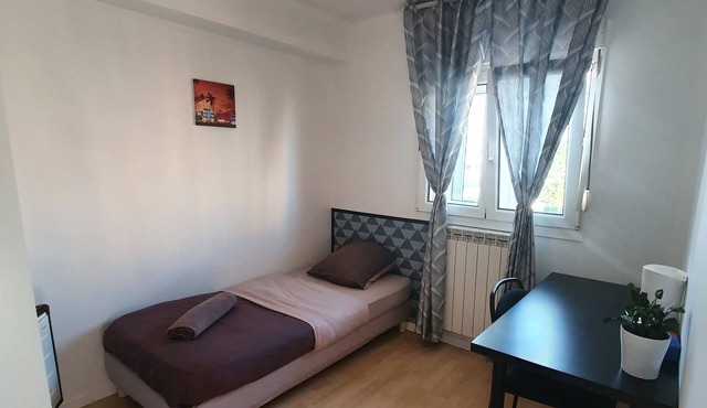 Single room with shared bathroom