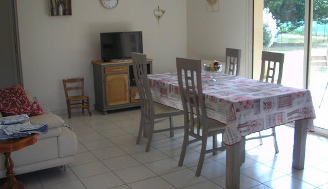 Single-storey residential house overlooking shady park.