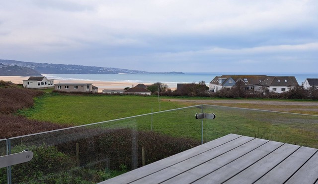 Situated in a sea front position with views extending towards St. Ives Bay