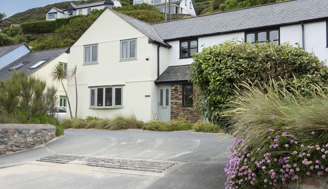 Situated only sixty meters from the Blue Flag sandy beach in the charming coastal village of Porthto