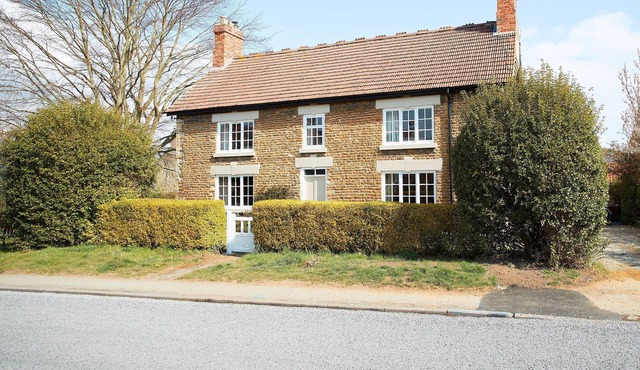 Situated within the picturesque village of Welburn in the Ryedale district of North Yorkshire, and w