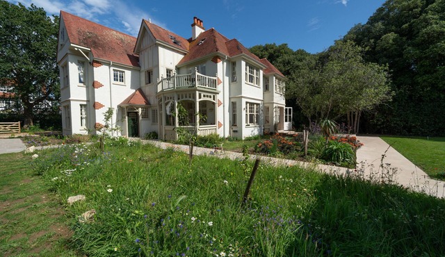 Six bedroom six bathroom character house with a lovely garden close to the beach