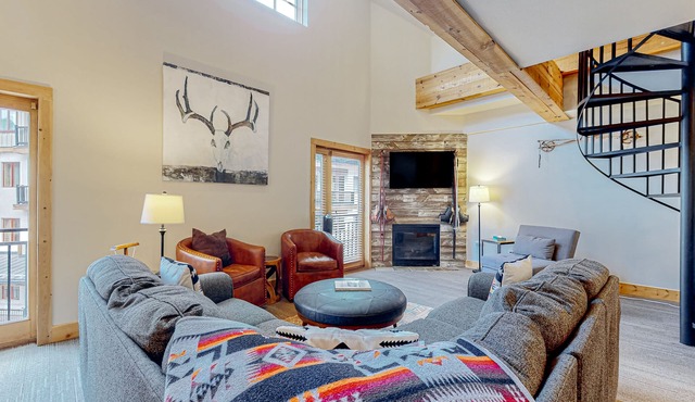 Ski-in/out condo with mountain views, central location, & fireplace