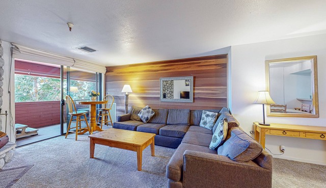 Ski-in/out condo with mountain view, private hot tub, deck & fireplace