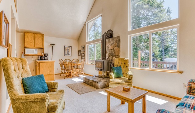 Ski-in/out dog-friendly home with deck, wood fireplace, grill & partial mtn view