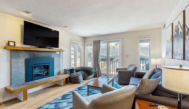 Ski-in/out mountainside condo w/mountain views, private deck, fireplace, w/d