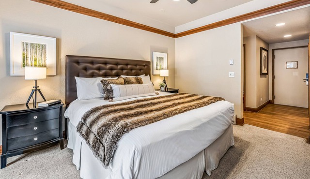 Ski-out suite with pools, hot tubs, spa, on-site dining, patio & mountain view