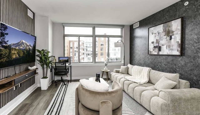 Sleek 2BR Residence with Gym, Parking & Rooftop Deck