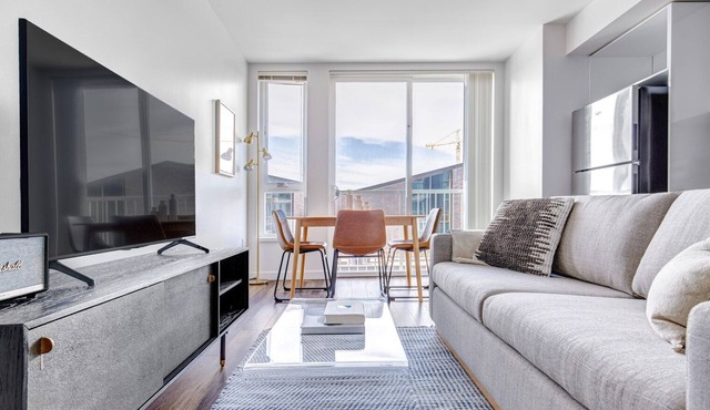 Sleek Bellevue 1BR w/BBQ, Gym, W/D, near Spring District, by Blueground