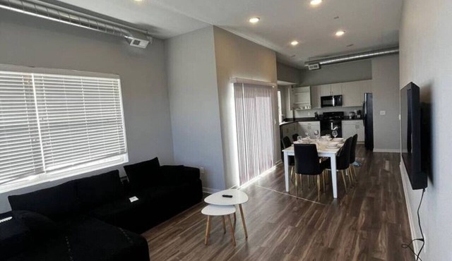 Sleek Black-and-White 2BR with Gym, WiFi & Free Parking