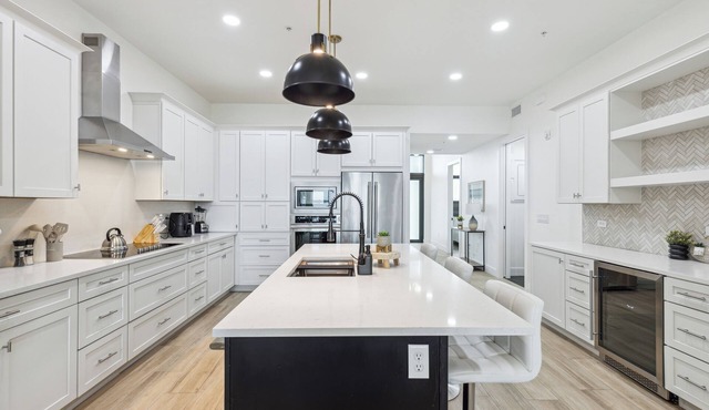 Sleek Coastal Condo with Stunning Riverfront Views and Luxury Amenities