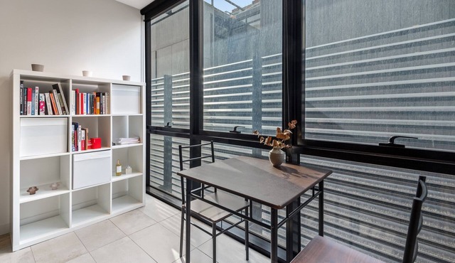 Sleek Inner-City 1-Bed Pad with Pool & BBQ