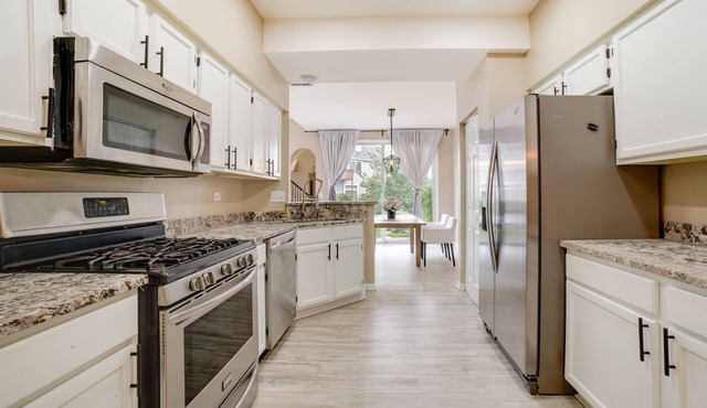 Sleek + Modern Lombard Townhome w/Pond View!