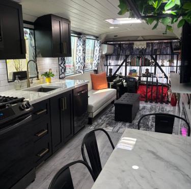 Sleek, Modern, Pet Friendly Custom Tour Bus!