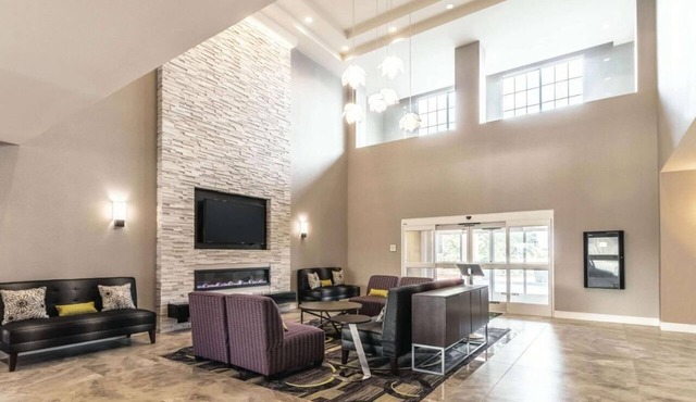 Sleep by the Thrills: 2 Cozy Hotel Rooms Near Six Flags & AT&T Excitement!