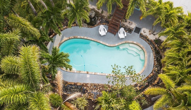 Sleeps 10 | Tropical 3BR Retreat w/Heated Pool, Outdoor Kitchen, and Fire Pit