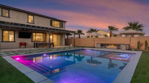 Sleeps 16 Pool Oasis w Game Room Hot Tub Fire Pit Desert Eden by AvantStay