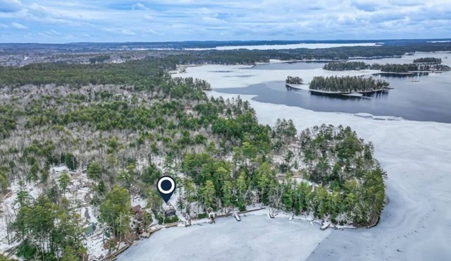 Sleeps 18! Large Waterfront Camp on Big Sebago with Two Docks & Sandy Beach