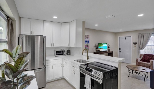Sleeps 4! Renovated, fenced private yard/patio. Pet Friendly.