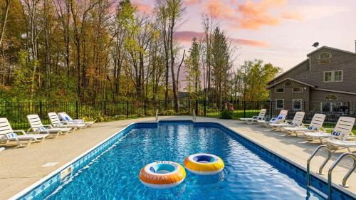 Sleeps 40 Heated Pool Hot Tub Fire Pit Game Room Brookside Mountain Retreat by AvantStay