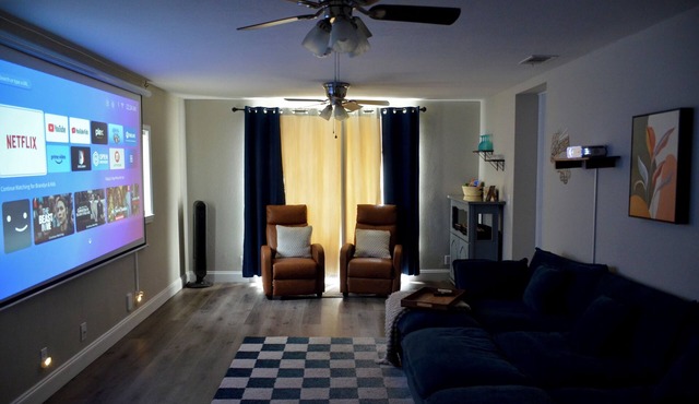 Sleeps 8! Pet friendly retreat by the beach + movie room and large fenced yard