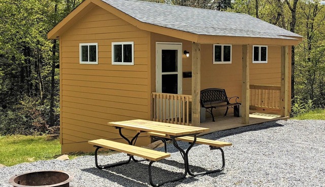 Sleeps up to 4, kitchenette, full bathroom, fire ring/picnic table, air conditioned/heated.
