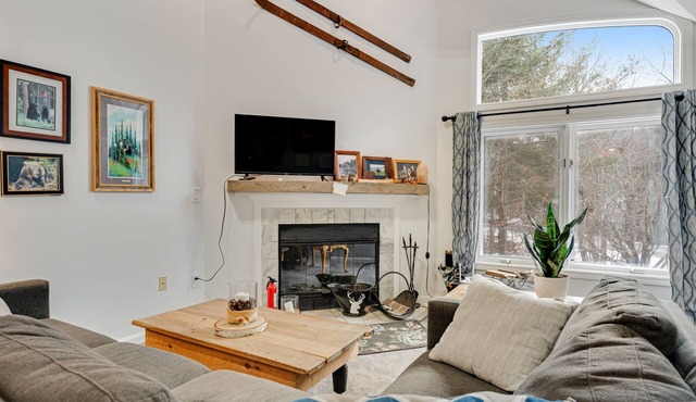 Slopeside condo with nearby skiing, balcony, fireplace, & washer/dryer