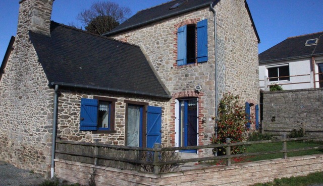 Small charming stone house between land and sea