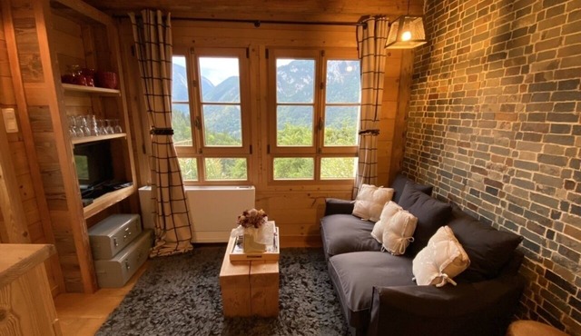 Small cozy n'est perched in the mountains