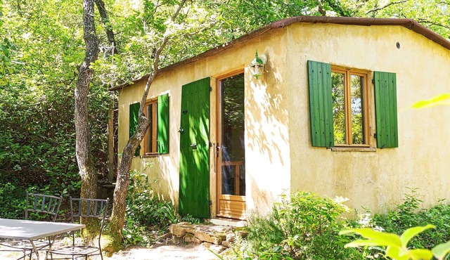 Small house on shady plot, swimming pool not overlooked, close to the village.