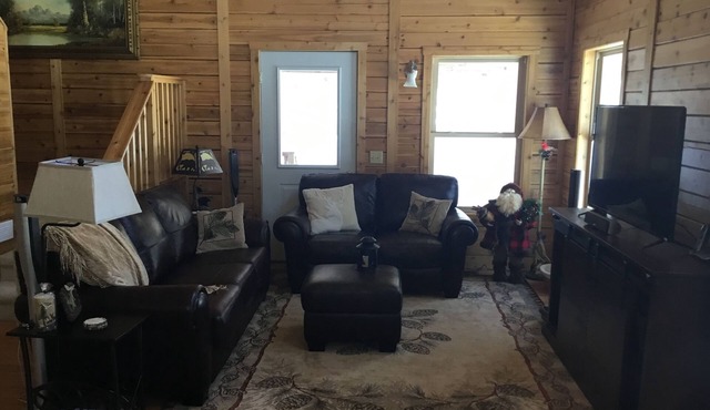 Small log cabin in the woods