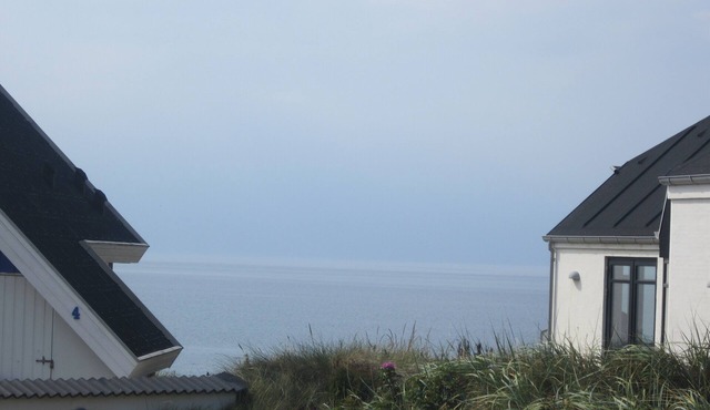 Small romantic fisherman with sea and beach
