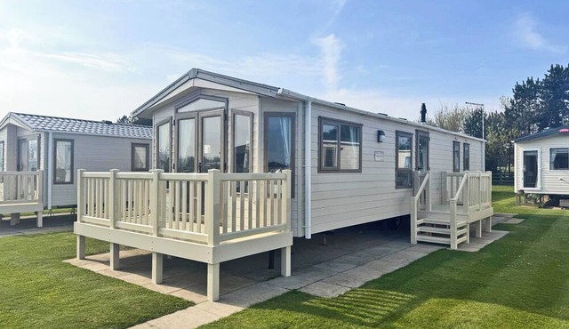 Smart, modern two bedroom caravan, perfect for couples and families alike.